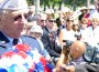 wreath-miliefsky Allen Miliefsky, state commander of Jewish War Vets, advances with wreath at Casket of the Unknown at Fort Rosecrans National Cemetery
