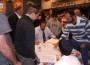 Rand Levin, striped blue and white shirt, moves in for a dreidel spin