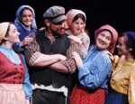 Tevye and family in Lamb's Players production of Fiddler on the Roof