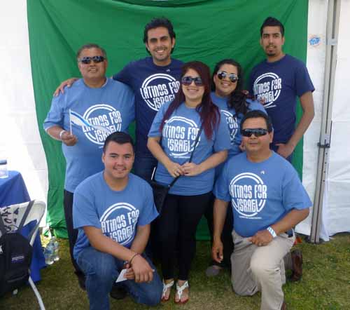 Latinos for Israel, standing, from left, Juan Rico, Jonathan Valverde, Alma Rico, Yssena Rico, David Delgado. Kneeling: Abel Abeldarama, Henry Aspeytia