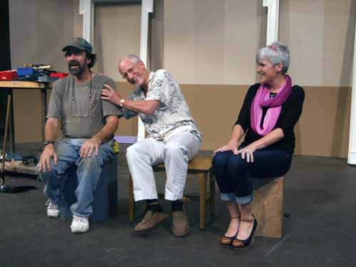 Martin Katz, director of 'An Ordinary Day' jokes with stagecraft technician David Weeks as Grossmont College Theatre Prof. Beth Duggan observes