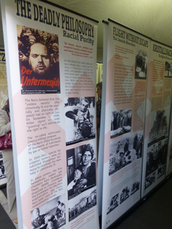 Holocaust posters at a preview of "Courage to Remember" exhibit