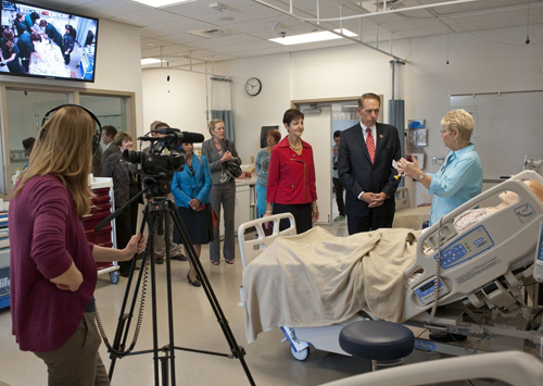 Debby Yaddow, right, dean of Grossmont College's Allied Health and Nursing, tells California Community Colleges Chancellor Brice W. Harris and Grossmont-Cuyamaca Community College District Chancellor Cindy Miles about laboratory dummies that are used to simulate sick patients. (Photo: Stephen Harvey, Grossmont College)