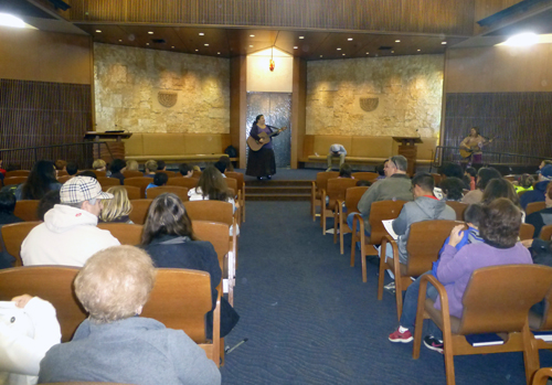 Rabbi Devorah Marcus leads her congregation in song