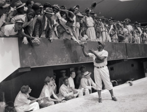 Jackie Robinson signing Autographs on the first of spring training with the Brooklyn Dodgers March 06, 1948 Donated by Corbis