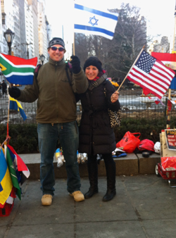 Josh and Mira with flags of their former countries