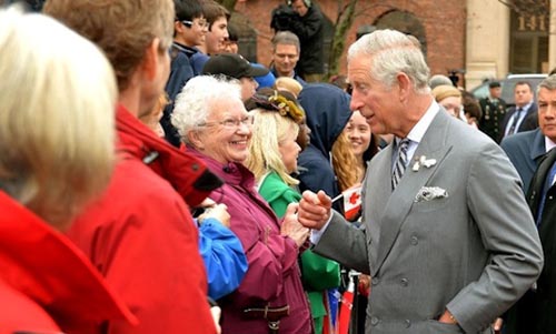 Prince Charles greets a crowd