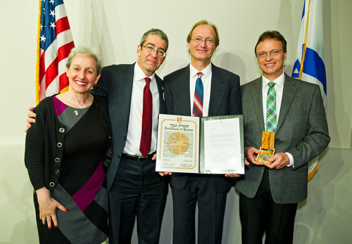 Nitza Gilad, left, Israel's Consul General Roey Gilad join Andrew and Frank Holecek, sons of the late Maria Holecek, honored as among the Righteous of the Nations