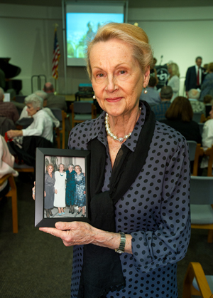 Dr. Saule Dietz holds photo of Maria Holecek (second from left), Mrs Dietz's mother, Mrs. Gene Petrauskas, and Dr. Holecek's two sisters, Dr. Olga Horwitz and Mrs. Stefanie Viaciunas