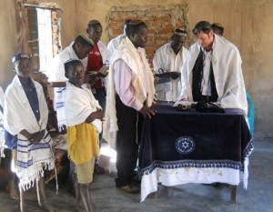 Abayudaya and visiting rabbi at prayer in village of Putti, Uganda  (Photo: Wikipedia)