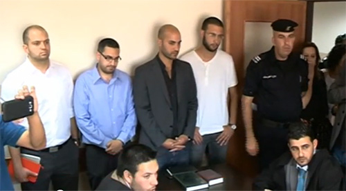 The four Palestinian BDS activists stand during their court appearance in Ramallah. (Image source: Wattan TV video screenshot)