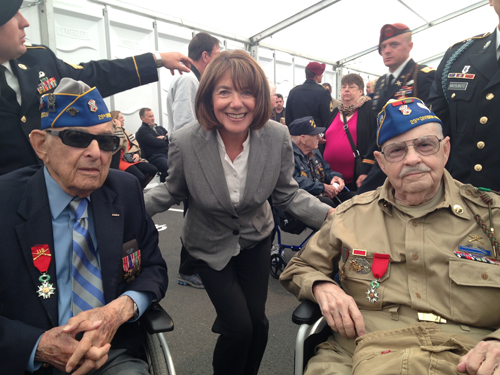 Rep. Susan Davis visits with veterans of the D-Day invasion at Normandy