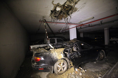 Truck destroyed in Ashdod garage by Gaza rocket