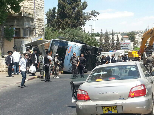 Bus upended, civilian killed, in terror attack with tractor~August 4, 2014