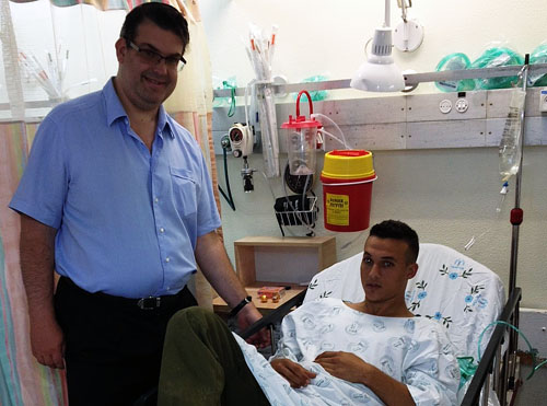 Oskar Deutsch and wounded Israeli soldier, August 2014