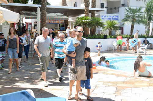 Families from communities bordering Gaza arrive at Hotel Leonardo Eilat