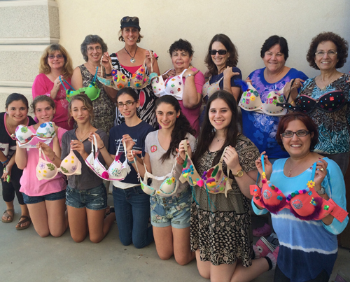 Hadassah grandmothers, mothers and daughters display decorated bras