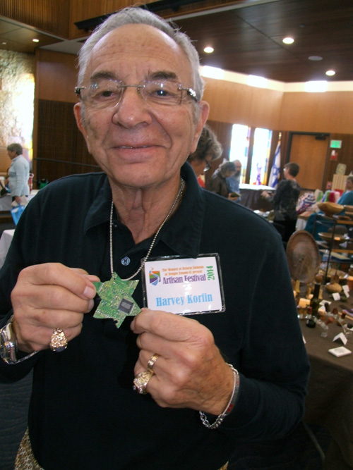 Harvey Korfin with Magen David pendant cut from a computer circuit board