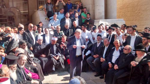 Druze clerics, Muslim imams, Baha'i representatives, Armenian patriarchs, Greek Orthodox priests, and the Sephardic Chief Rabbi Shlomo Amar, among others gather together to condemn the brutal attack at the Har Nof synagogue in Jerusalem, Wednesday November 19. (Photo: Anav Silverman, Tazpit News Agency)