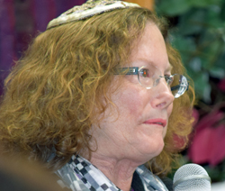 Rabbi Aliza Berk speaking at Chabad Center of University City