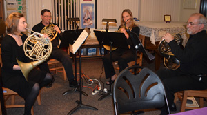 Tucked in a corner of the Astor Judiaca Library was a French Horn quartet comprised of Liesl Hansen, R.B. Anthony, Erika Wilsen, and Scott Miller