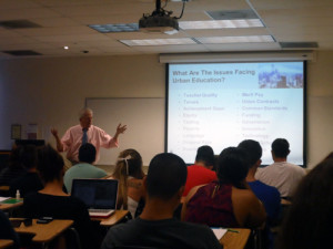 Bernie Rhinerson teaching a class in public administration at SDSU