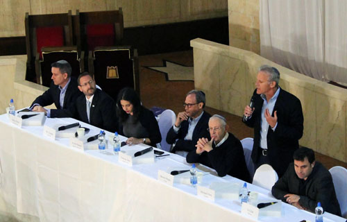 Ashley Perry of Yisrael Beiteinu, MK Dov Lipman of Yesh Atid, MK Ayelet Shaked of Bayit Yehudi, Nachman Shai of Zionist Union, Benny Begin of Likud, Michael Oren of Kulanu and Uri Zaki from Meretz debated Saturday eveing, March 14. (Photo: Reemon Silverman, Tazpit News Agency)