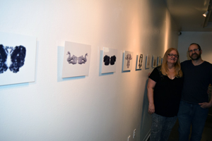 Rohrschachs by Paula Levine point to curators Debbie and Larry Kline