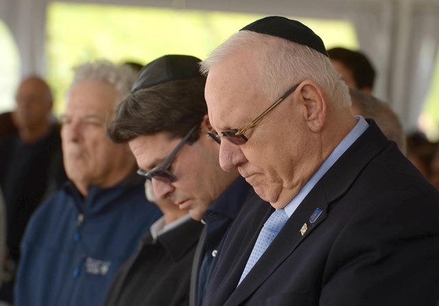 President Rivlin bows his head at a commemoration on the 95th anniversary of Joseph Trumpledor laying down his life for his country.