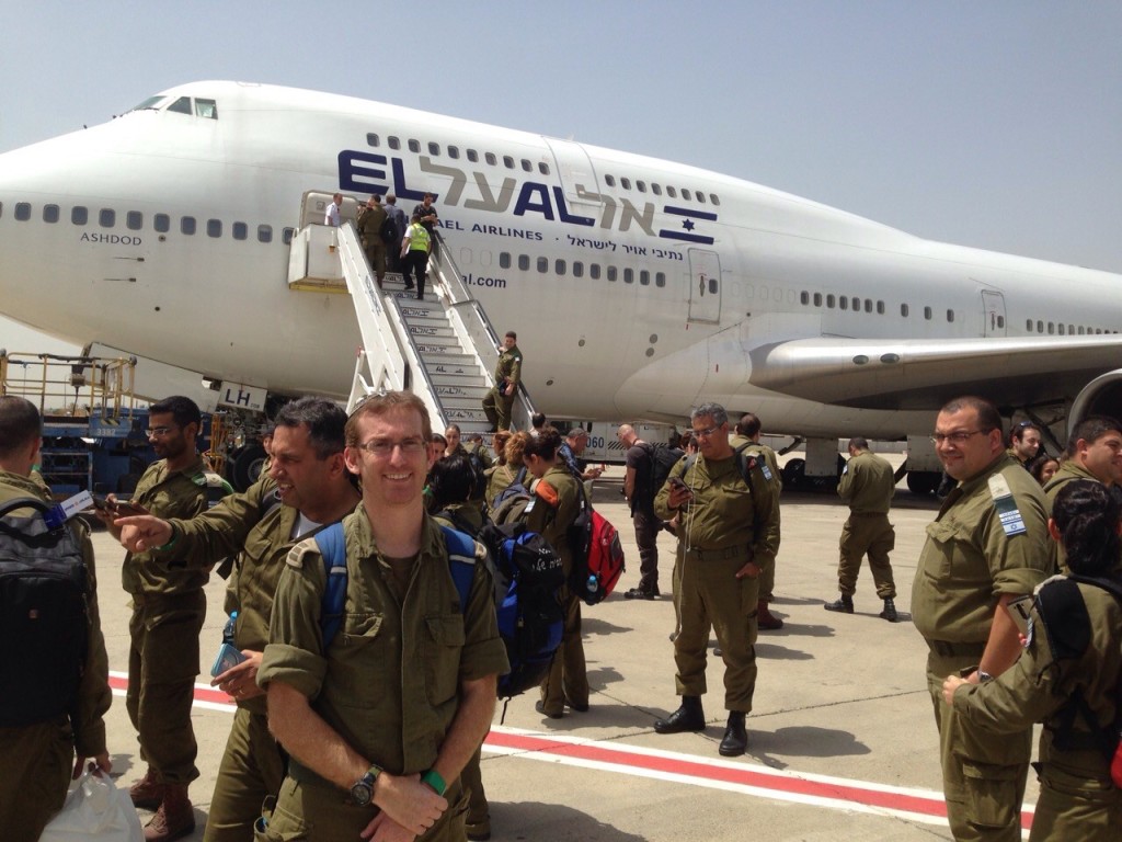 Red-headed Dr. Giora Weiser, nephew of Rabbi Simcha Weiser, headmaster of the Soille San Diego Hebrew Day School, readies to fly to Nepal with other members of Israel's rapid response team.