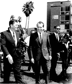 Ronald Reagan, left, and Richard Nixon walk to their meeting room at the Bahia Hotel, 1968. (Photo: Courtesy of Bahia Hotel)