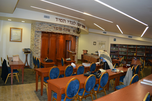 A man in solitary prayer in the Beit Midrash of Beth Jacob Congregation