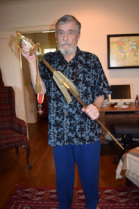 Dave Stutz, posthumous son-in-law of Col. Solomon displays the sword utilized in the knighthood ceremony