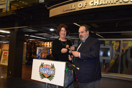 Outgoing president Marilyn Williams presents incoming president Geoffrey Berg with the gavel at Soille San Diego Hebrew Day School Gala on Sunday, June 7, 2015