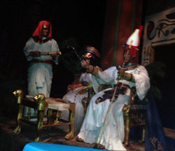 Egyptians with papyrus scroll at Epcot ride featuring the history of communication
