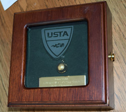 One of several "Gold Ball" Awards Snyder has won, signifying a U.S. national championship 