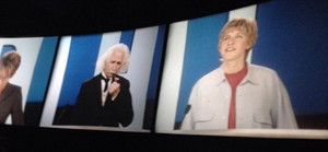 An Einstein character is flanked by Jamie Lee Curtis, left, and Ellen DeGeneres right in Epcot presentation on development of energy