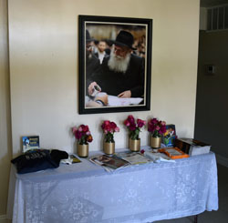 Portrait of the late Rebbe Menachem Mendel Schneerson hangs near the entrance of Chabad House