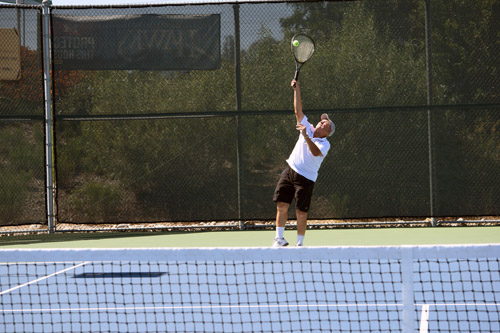 Saul Snyder serves at Lake Murray Tennis Club