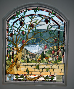 Jerusalem framed by a pomegranate branch