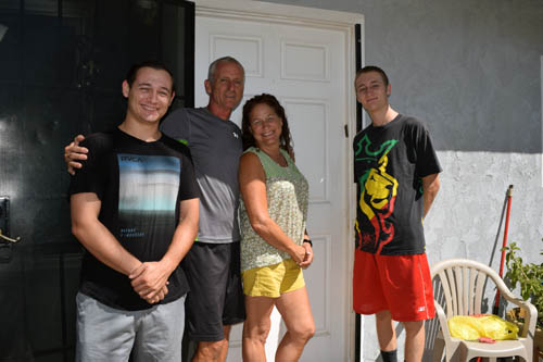 The Stroh family: Mason, Marty, Melissa and Max stand by mezuzah on front doorpost