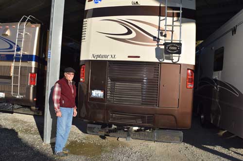 Bill Sperling stands in front of his 37-foot motor home