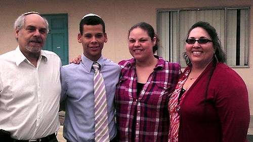 Alan Goldenberg and Giela Gray bookend their son Brandon and Alan’s daughter Laura