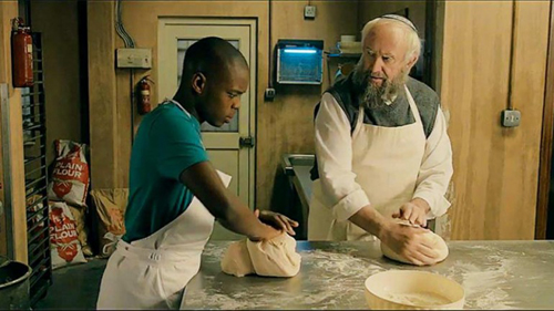 Jerome Holder, left, and Jonathan Pryce in 'Dough'