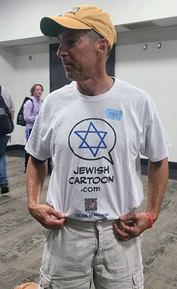 Jordan Gorfinkel wears a T-shirt promoting his personal website.